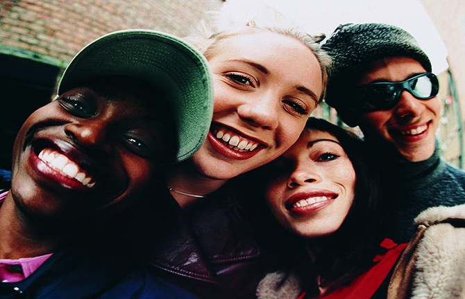 youth of different backgrounds group together for a picture